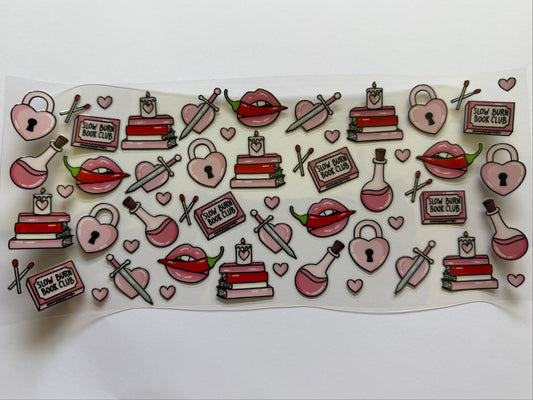 Sheet of decorative stickers with hearts, lips, cakes, and other designs on a white background.