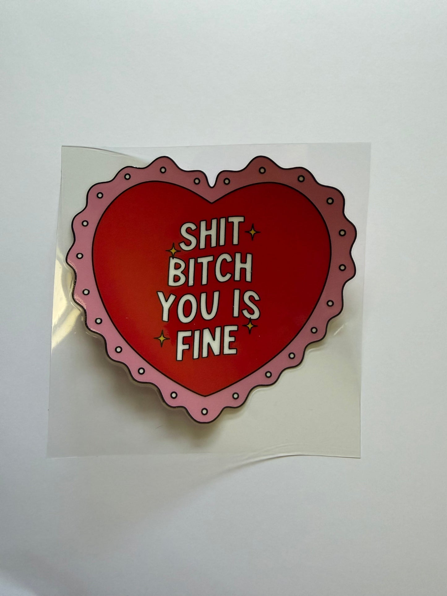 Card with a red heart design and text on a white background