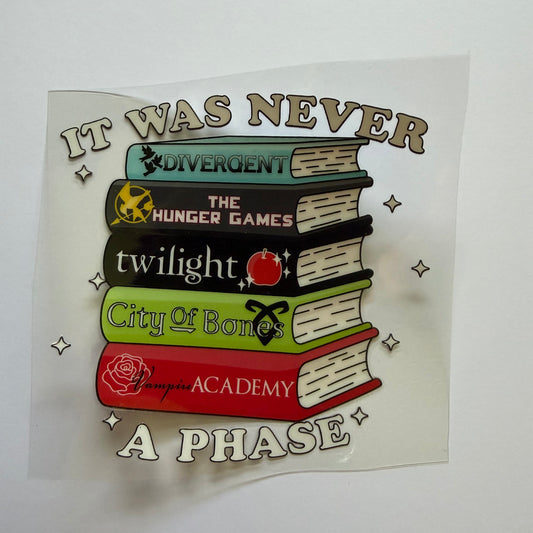Decorative sticker with book designs and text on a white background
