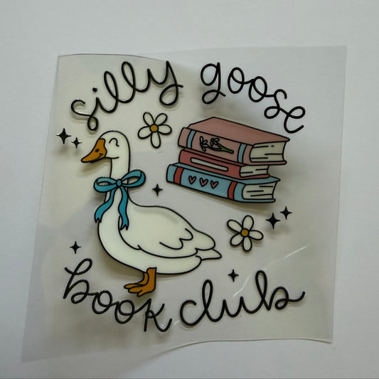 Sticker with a goose, books, and flowers on a white background