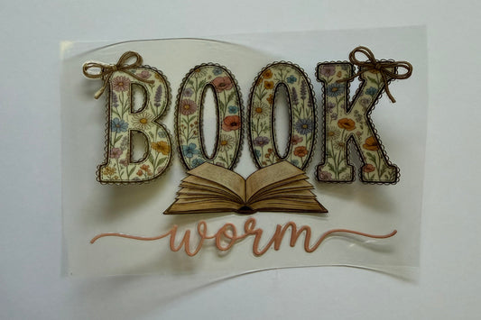 Decorative sticker with 'book worm' text and a stylized book on a white background