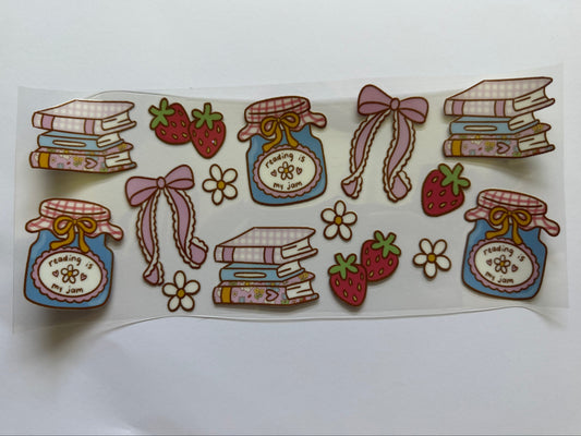 Set of decorative stickers featuring jars, books, strawberries, and flowers on a white background.